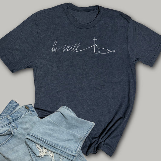 Be Still- Mountain and Cross - Softstyle Triblend T-Shirt