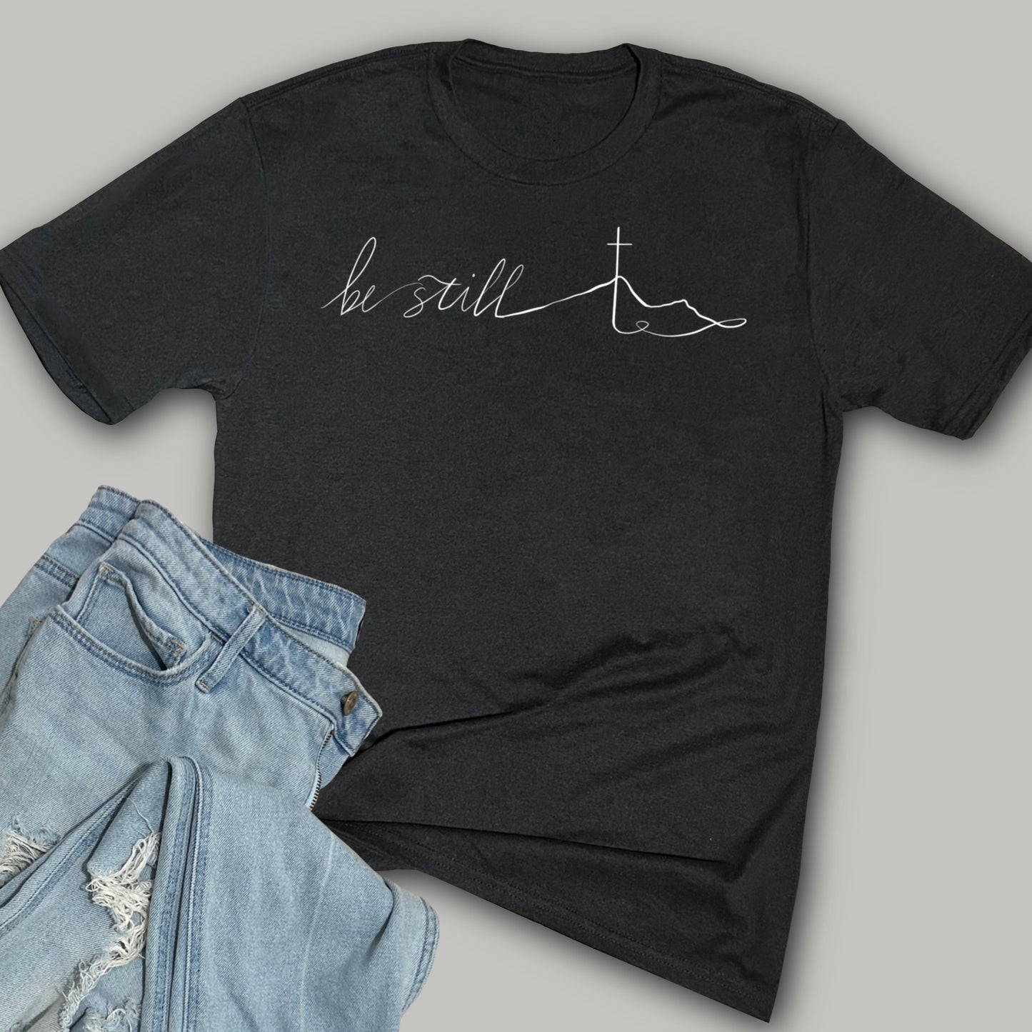 Be Still- Mountain and Cross - Softstyle Triblend T-Shirt